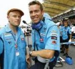 The Prodigy's front man Keith Flint (left) with Rizla Suzuki Team Manager Paul Denning (right).